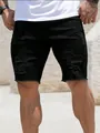 Men's stylish black ripped denim shorts with heavy distressing and frayed edges - S / Bottoms / Black