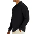 Close-up of black men's long-sleeved polo shirt showing vertical ribbed fabric texture - S / Tops / Black