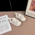 Elegante cremefarbene Mädchen Sneaker mit Schleife und Perlen Verzierungen. - 22 / Gebrochenes Weiß