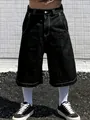 Men's vintage black wide-leg denim shorts featuring bold white contrast stitching detail - S / Bottoms / Black