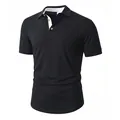 Polo negro de manga corta para hombre con cuello en contraste blanco y bolsillo. - S / Tops / Negro