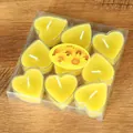 9er-Pack romantische herzförmige gelbe Kerzen in transparenter PVC-Geschenkbox - 9er Set / Gelb