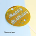 Golden circular glitter paper cake topper with Happy Birthday cutout, 9cm diameter - Round HB Star Gold