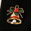Festive Christmas bell brooch featuring green holly leaves and a white pearl drop - Christmas Bell (7544)