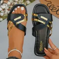 Stylish women's black and gold flat slide sandals featuring elegant crisscross straps - 36 / Black