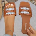 Sandales plates marron pour femmes avec des ornements élégants en strass - 35 / Brun Foncé
