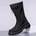 Rugged black men's high-top motorcycle leather boots with metallic toe cap accents - 38 / Black