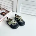 Close-up of breathable black and green mesh children's sandals on a white surface - Size 39 Inner Length 24.1cm / Black