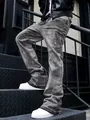 Close-up of distressed grey denim pants with paint splatter detail and curved leg cut - M / Bottoms / Gray