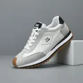 Baskets stylées pour hommes en cuir blanc et gris avec une maille respirante - 38 / Blanc