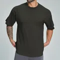 Camiseta oversize para hombre de algodón orgánico en color verde oliva oscuro - S / Tops / Verde Militar Oscuro