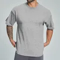 Camiseta de manga corta de algodón orgánico holgada y cómoda en color gris jaspeado - S / Tops / Gris Mezcla