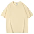 Detail van de textuur van een lichtgeel heren T-shirt van katoen met ronde hals - S / Tops / Khaki