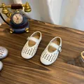 Close-up top view of white French hollow-out Mary Jane shoes on a vintage wooden table - 23 (Inner Length 15.0cm) / Off White