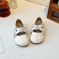 Beige girls floral Mary Jane shoes with cross straps and cute shell toe details. - 22 / Off White