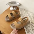 Detailed view of children's brown suede sandals featuring a cute embroidered smiley face - 26 / Brown