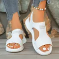 Close-up of stylish white knit fish mouth sandals with FASHION label on rustic wooden deck - 36 / White