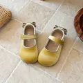 Close-up top view of yellow velvet toddler Mary Janes with delicate heel bow details - Size 21 (Inner 13cm) / Yellow