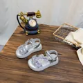 Elegant silver girl's princess sandals with mesh bows and pearls on wooden table - 26 (Inner Length 16.5cm) / Silver
