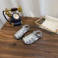 Detail view of silver woven hollow-out closed-toe sandals for girls with vintage props - 37 / Silver
