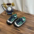 Close-up detail of breathable mesh children's sneakers with green and navy accents - 22 (Internal Length 14cm) / Green