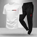 Ensemble de sport deux pièces pour hommes avec t-shirt PARIS blanc et jogging noir - S / Haut Et Bas / Manches Courtes & Pantalon / Blanc