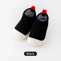 Soft-soled black knit baby pre-walker floor shoes with non-slip white rubber toe cap - Black