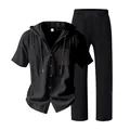 Detailed view of black linen-textured hooded shirt and long pants casual set for men. - Black