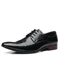 Detail shot of men's black crocodile pattern leather dress shoes with lace-up design - 38 / Black