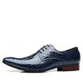 Detailed side view of navy blue men's pointed-toe dress shoes with alligator texture - 38 / Blue