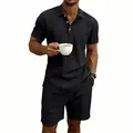 Detailed view of men's summer black linen polo shirt and shorts set with textured fabric - Black