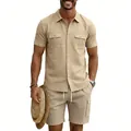 Full shot of a man wearing a beige linen short-sleeve shirt and matching cargo shorts - Light Khaki