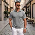 Men's grey short-sleeved polo shirt featuring a textured jacquard weave pattern - S / Tops / Light Gray