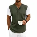 Close-up detail of a men's waffle knit Henley shirt in army green and white contrast - S / Tops / Army Green