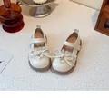 Detail of sweet girls' princess flats in off-white with lace bow and pearl charms - 23 / White