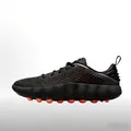 Side view of Mind 002 training shoes with black perforated upper and massage pods - Black