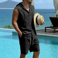 Lifestyle shot of men's black sleeveless hooded linen shirt and shorts set by the pool - S / Top And Bottom / Black