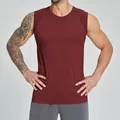 Men's seamless athletic tank top in maroon finish, breathable fitness and gym wear - Red
