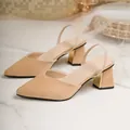Elegant beige pointed-toe slingback sandals with chunky block heels and gold accents - Off White