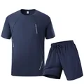 Hochwertiges schnelltrocknendes Sportset für Herren mit dunkelblauem T-Shirt und Shorts - XS / Oberteil und Hose / Dunkelblau