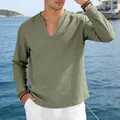 Close-up of olive green linen v-neck long sleeve shirt for men in casual resort setting - Army Green
