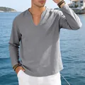 Detail of grey men's casual linen V-neck long sleeve T-shirt at seaside - Gray