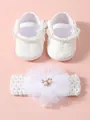 White lace baby princess shoes and matching floral headband set on pink background - White With Headband (26-006)