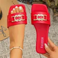 Vibrant red flat sandals with golden chain buckle detail for summer beach style - 35 / Red