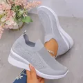 Grey breathable flyknit wedge sneakers with rhinestone detailing and slip-on design. - 36 / Light Gray