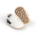 Detail of white baby walking shoes with velcro strap and non-slip rubber sole - Insole Length 11cm / White