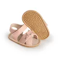 Detailed macro view of pink baby pre-walker sandals featuring delicate floral embroidery - 11 / Pink