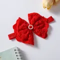Detailed view of a red lace bow baby headband with pearl center embellishment - 0-3 Years Old / Red