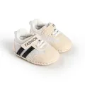 Detailed close-up of beige striped breathable baby walking shoes with mesh fabric - White Black Stripes (NC-516)