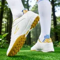 Professional white and gold TF turf soccer shoes for youth athletes training on grass field - 35 / Platinum